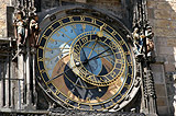 Astronomical clock dial and the four virtues : Vanity, Miser, Death, Turk (from left to right)