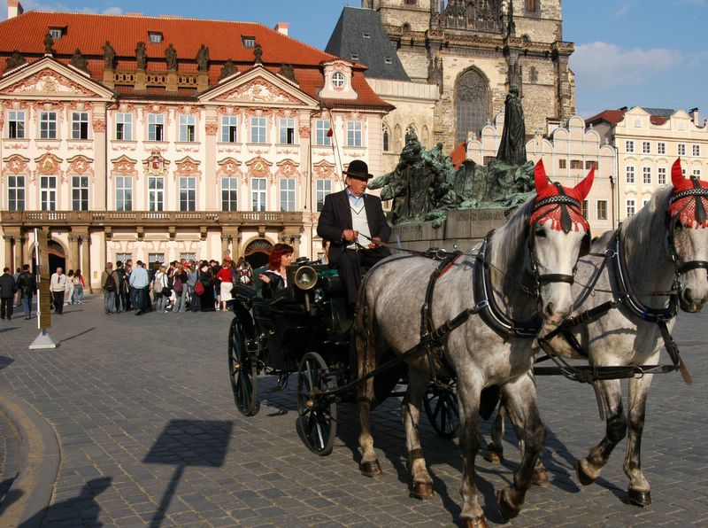 Horse drawn carriage in front of Kinsky Palace