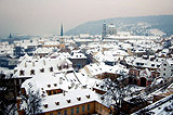 Snow over Prague roofs