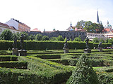 Statues with stalactites wall at the background